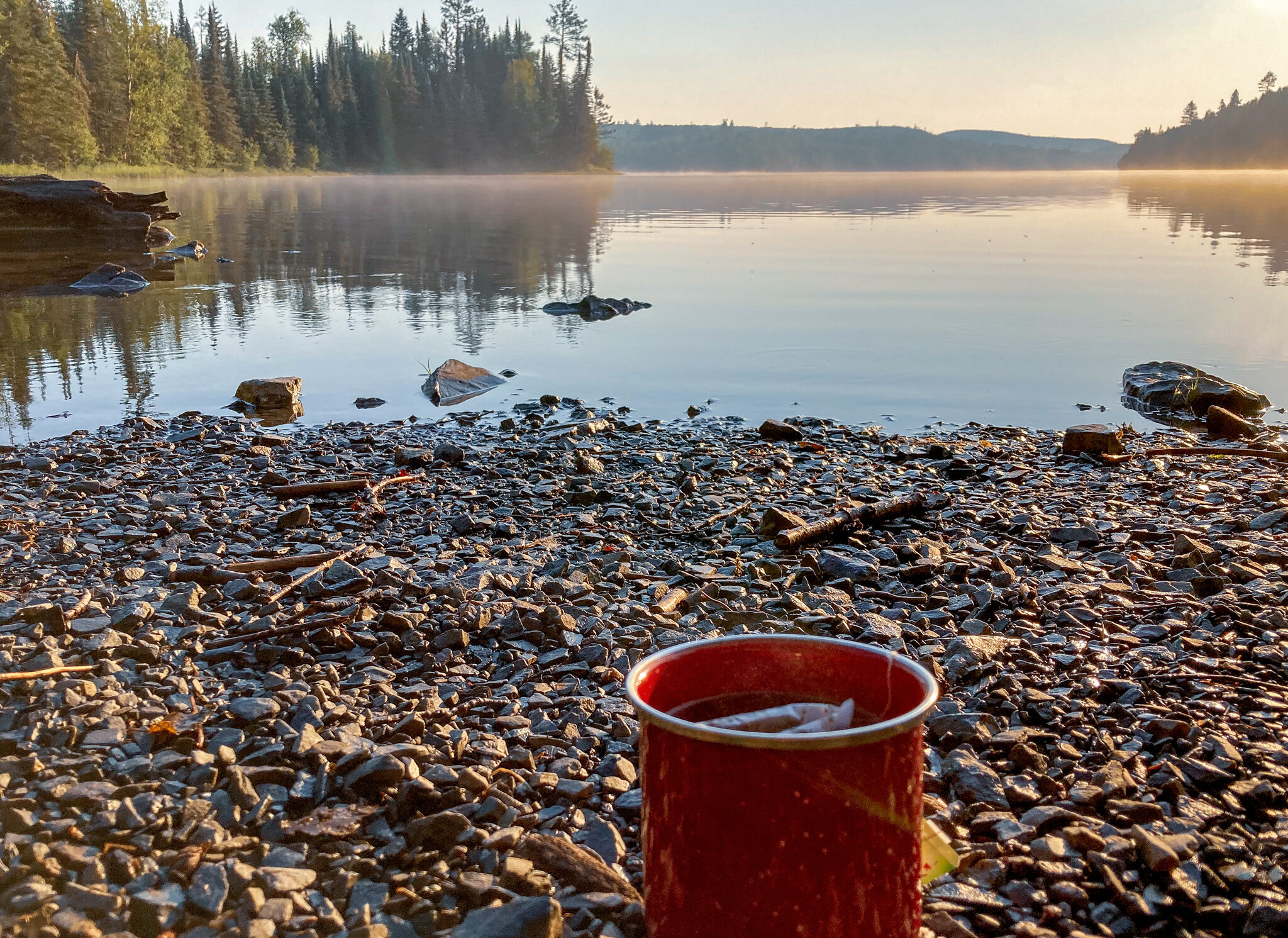 Cup of tea and a calm lake on the Border Route Trail in the BWCA