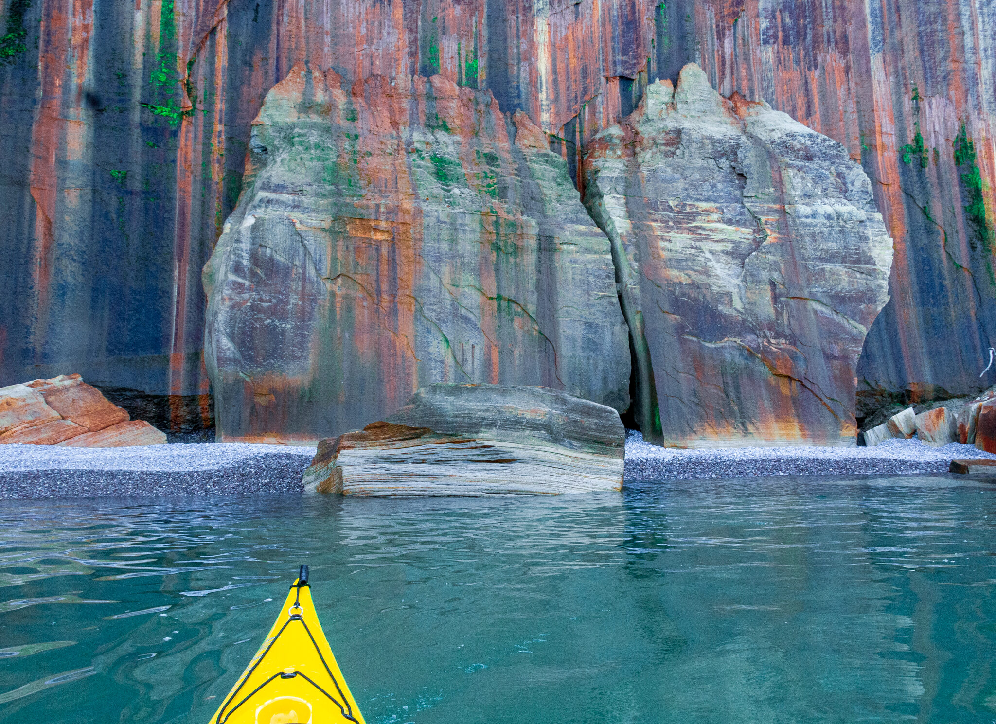 image of a Yellow Sea kayak at the Pictured Rocks Cliffs on Lake Superior