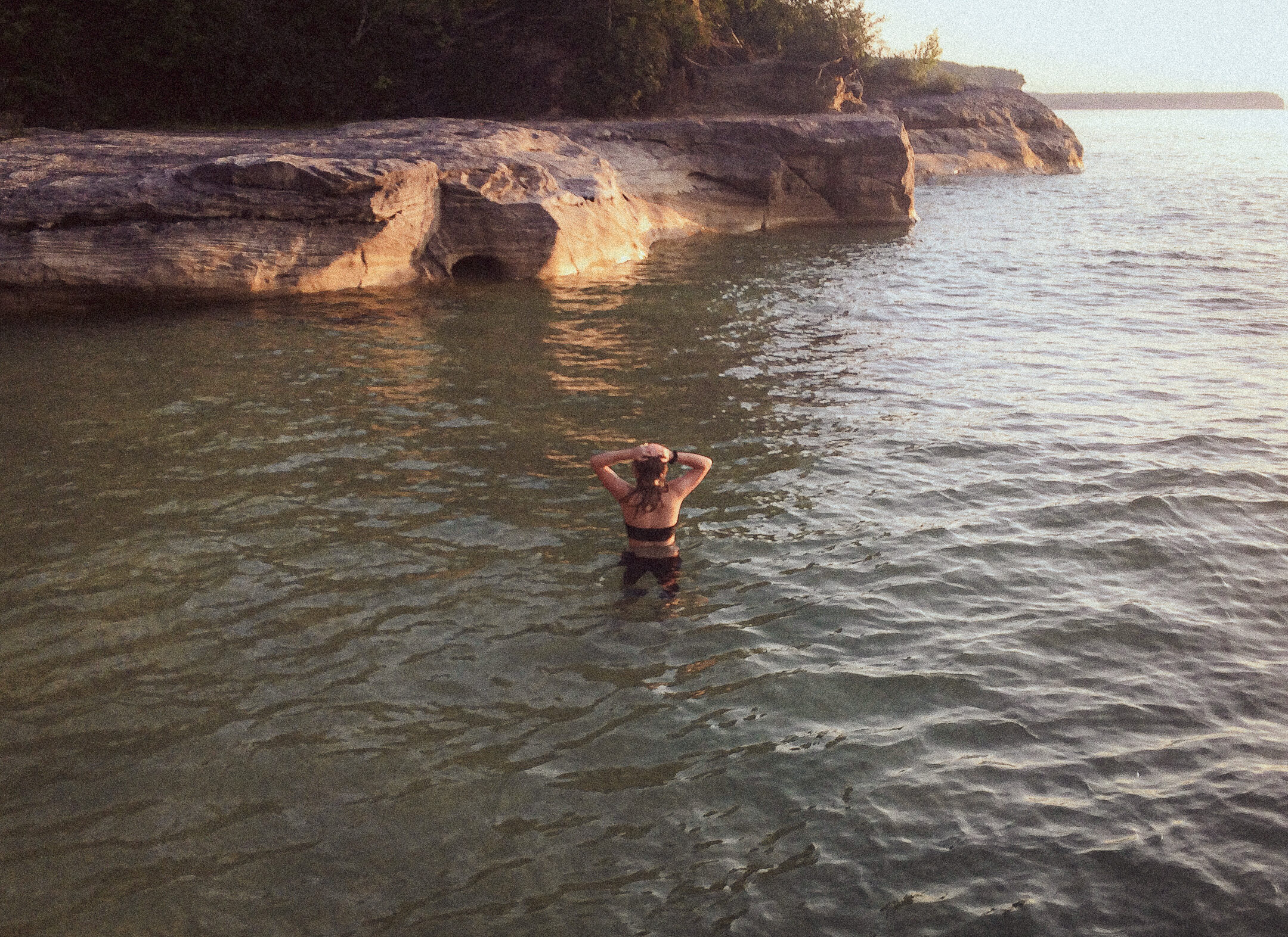 best places to swim in the pictured rocks, swimmer in "the coves"