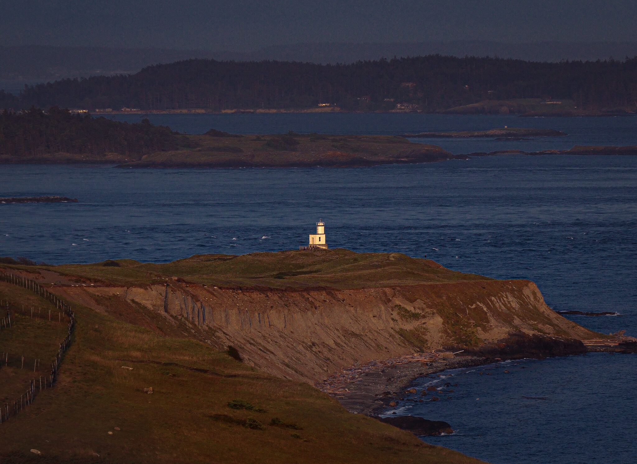 best day hikes in the san juan islands, cattle point lighthouse viewed from Mt Finlayson