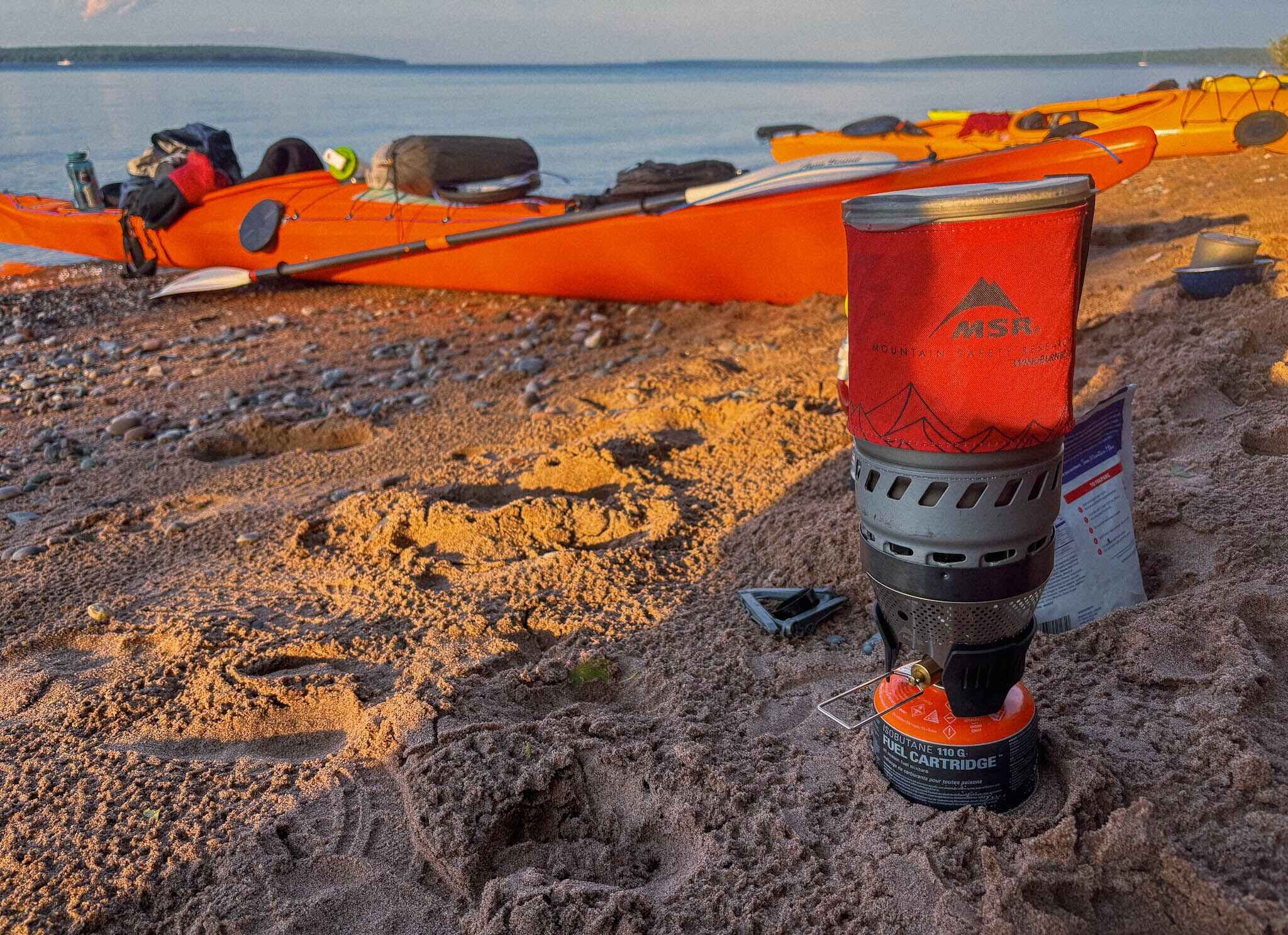 image of MSR WindBurner in front of kayaks on Oak Island