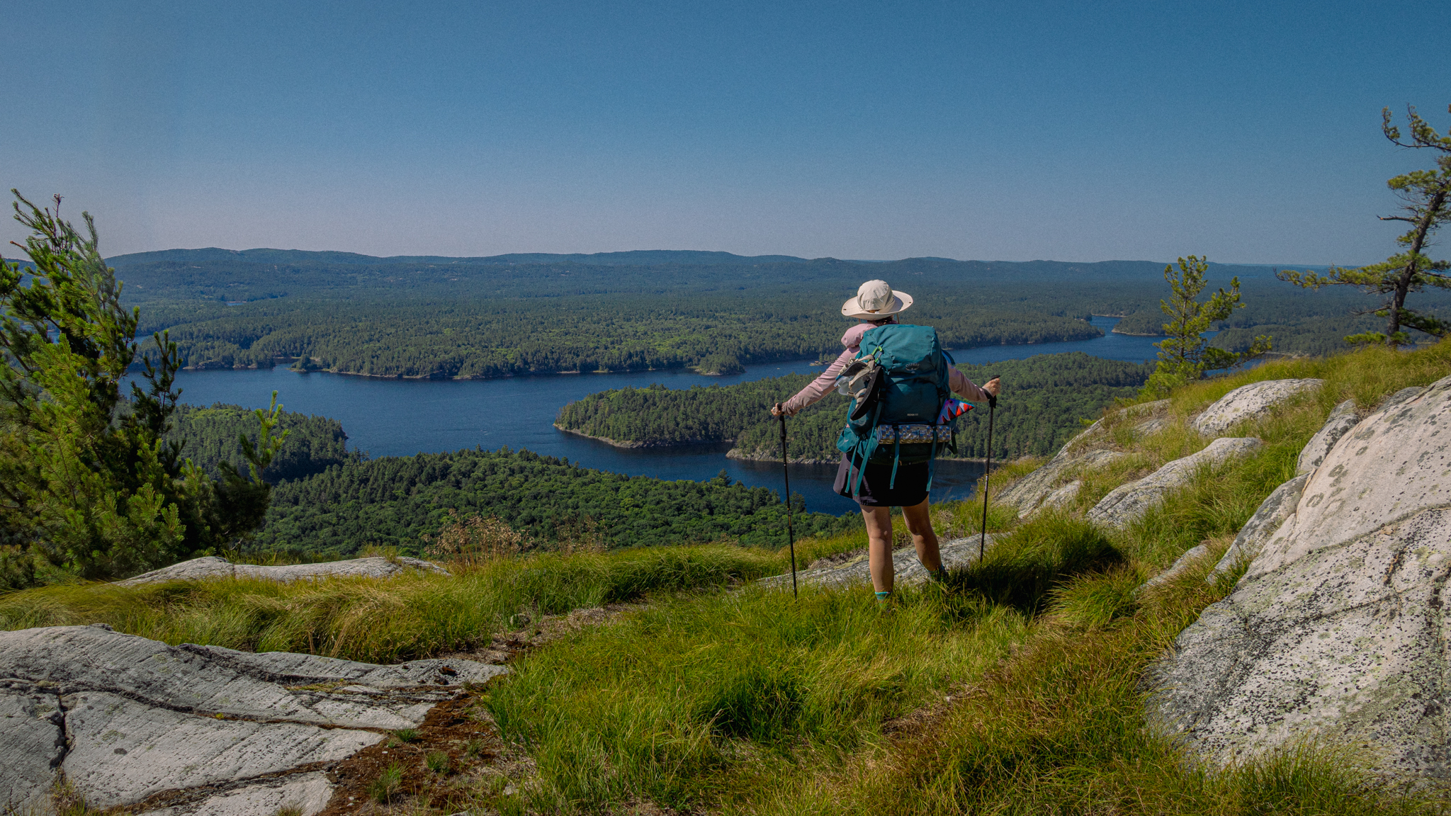 image of a backpacker standing at an overlook